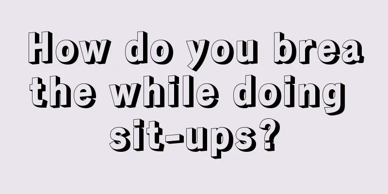 How do you breathe while doing sit-ups?